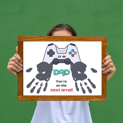 Celebrate Fathers Day with our handprint craft for gamer dads. Show your appreciation with the message, Dad, you are on the next level! Perfect for gaming enthusiasts, this personalized gift promotes creativity and captures cherished memories.