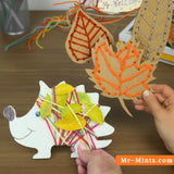 Printable autumn craft templates for kids featuring leaf outlines and a cute hedgehog pattern. Perfect for preschool, kindergarten, and classroom fall art projects. Great for cutting, coloring, or decorating with real leaves or yarn. Instant digital download for creative autumn crafts.