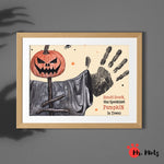 Spooky Halloween pumpkin handprint craft for kids featuring a jack-o’-lantern scarecrow and a black handprint, perfect for DIY decoration.