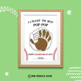 Grandparents Day printable Pop-Pop handprint keepsake featuring a large outlined baseball glove with a child’s brown painted handprint inside, the playful message “I Caught the Best Pop-Pop,” red baseball stitching, Happy Grandparents Day wording, and a name line, designed for kids ages 3–7 to create a personalized baseball-themed gift.