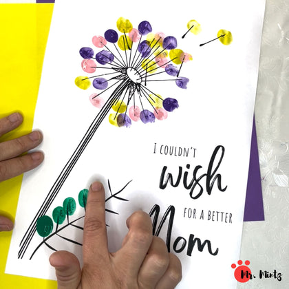 Mom will adore this simple fingerprint Mother's Day art which works great for even the littlest kids to give to mom.