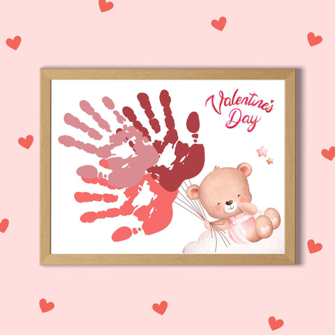 Valentine’s Day handprint craft for kids with a teddy bear and handprint balloons design.