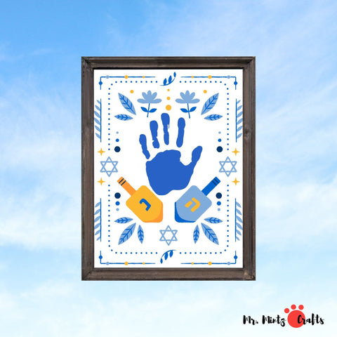 Blue handprint with dreidels and Stars of David, a downloadable Hanukkah handprint craft for festive family fun.