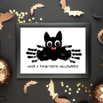 A cute and cheeky Halloween Bat handprint craft for kids. Great for Halloween party decorations, greeting cards. 