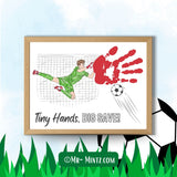 Printable soccer goalkeeper craft displayed as a finished handprint activity with a colored goalie, ball, net, and bold “Tiny Hands, BIG SAVE!” wording, designed for preschool and kindergarten classrooms where children can print, stamp, and color a simple sports-themed art project with guided teacher help.