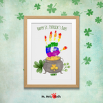 A sweet and simple project to do with your kids for St. Patricks Day. This Shamrock Pot of Gold Rainbow Handprint Art makes the perfect card for parents, grandparents and loved ones!
