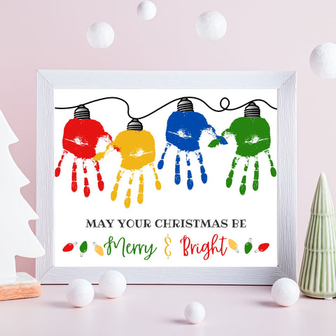 A handprint Christmas light craft to do with your kids. Download the  Handprint Lights for your kids for a fun Christmas craft, preschool craft, school craft, Sunday school craft, or for a sweet Christmas gift for family.