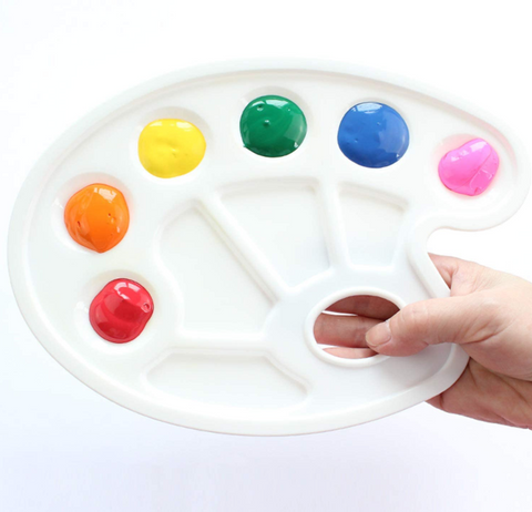 Paint tray has six round wells and four rectangular wells and a thumb hole. The wells are large enough for little not-fully-yet-coordinated hands with brushes to get into without messing up nearby colors.